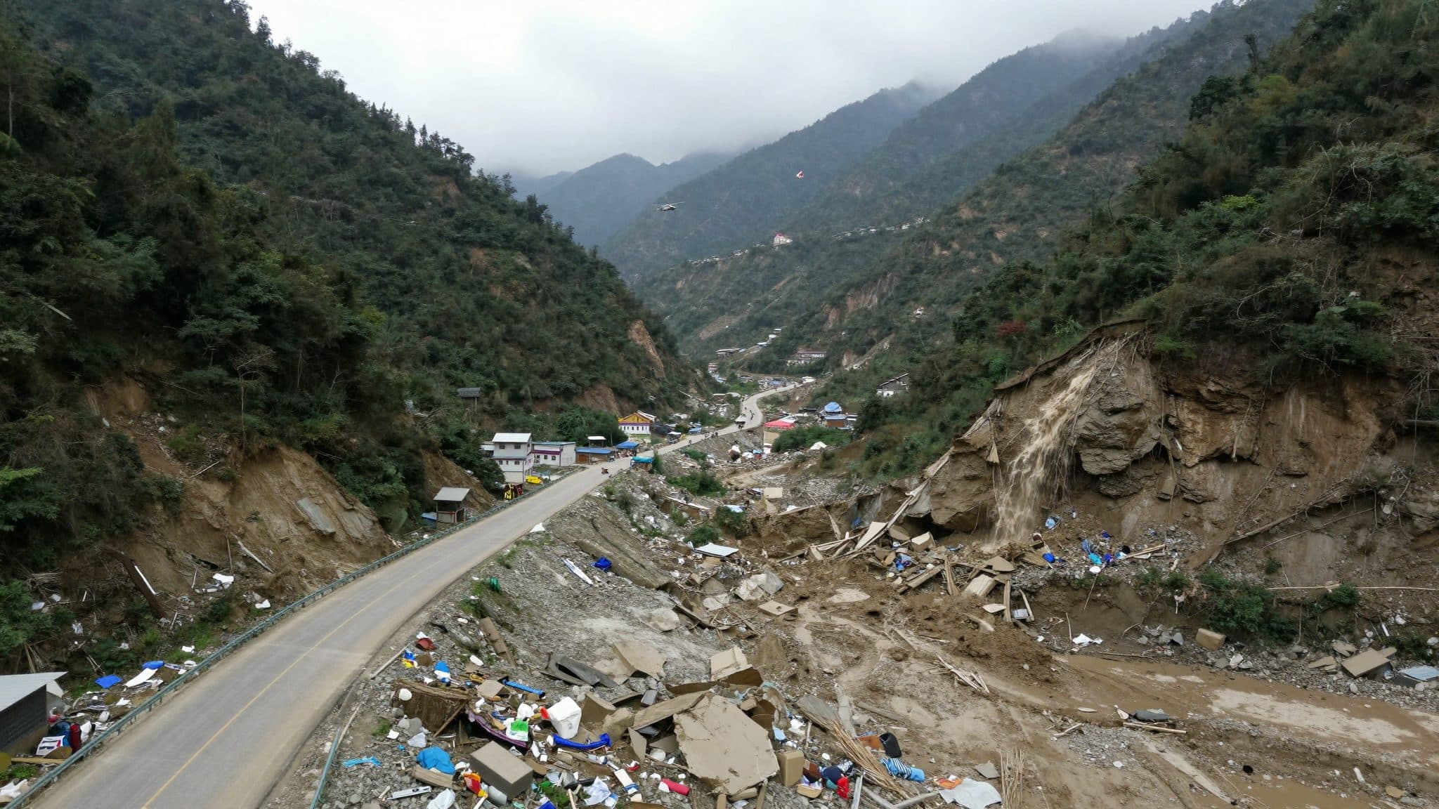 Search continues for more than 1,500 people missing after Nepal-Tibet border floods